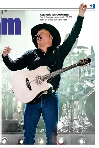  ?? ?? KEEPING ’ER COUNTRY: Garth Brooks performs to 80,000 fans on stage at Croke Park