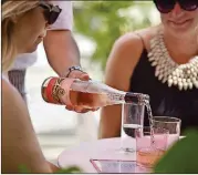  ?? JAHI CHIKWENDIU/WASHINGTON POST ?? The Rosé Garden at Whaley’s restaurant in Washington last summer.