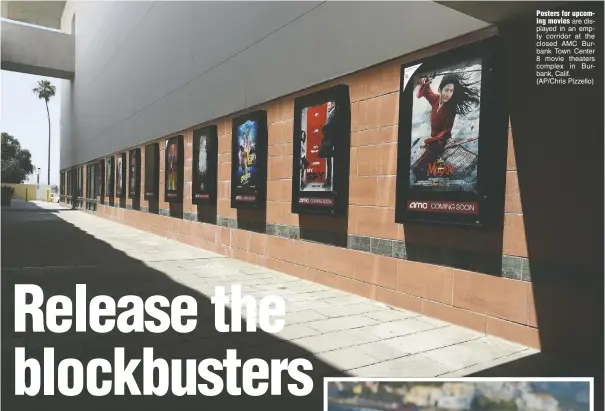  ??  ?? Posters for upcoming movies are displayed in an empty corridor at the closed AMC Burbank Town Center 8 movie theaters complex in Burbank, Calif. (AP/Chris Pizzello)