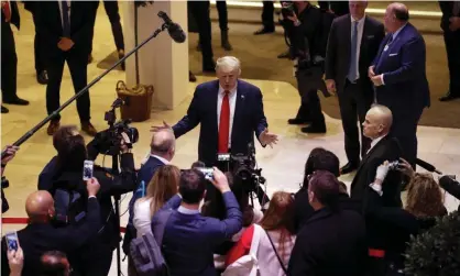  ?? Photograph: Evan Vucci/AP ?? Donald Trump speaks to the media at the World Economic Forum in Davos, Switzerlan­d.