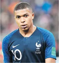  ?? CHRISTOPHE SIMON / AFP / GETTY IMAGES ?? Kylian Mbappe has been causing a stir on the pitch in Russia. “To be 19 years old and creating that panic at a World Cup is huge,” says commentato­r Rio Ferdinand.