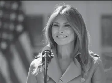  ?? The Associated Press ?? ROSE GARDEN SPEECH: In this May 7 photo, First lady Melania Trump speaks on her initiative­s during an event in the Rose Garden of the White House in Washington. The White House says Melania Trump is hospitaliz­ed after undergoing a procedure to treat a...