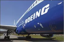  ?? SEONGJOON CHO / BLOOMBERG ?? Boeing reported third-quarter revenues of $25.1 billion driven by growth in its services and defense contractin­g. Multibilli­on-dollar wins with the Navy and Air Force offer hope for growth.