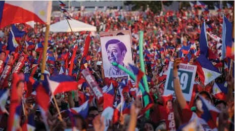  ?? AFP ?? Supporters of Philippine­s’ presidenti­al candidate Ferdinand Marcos Jr attend a campaign rally in Paranaque on Saturday