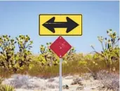  ?? ?? A sign along Joshua Tree Highway, part of the journey to Avi Kwa Ame in southern Nevada.