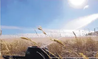  ?? COURTESY OF ENCORE GREEN ?? Encore Green Environmen­tal’s pilot project to irrigate rangeland with treated oiland-gas wastewater in Wyoming.