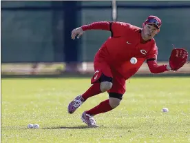  ?? ASSOCIATED ?? New Reds outfielder Shogo Akiyama, a star in Japan, participat­es in outfield drills Friday at spring training in Goodyear, Arizona. Akiyama is meeting his teammates for the first time, except for third baseman Eugenio Suarez, who toured Japan in 2017.