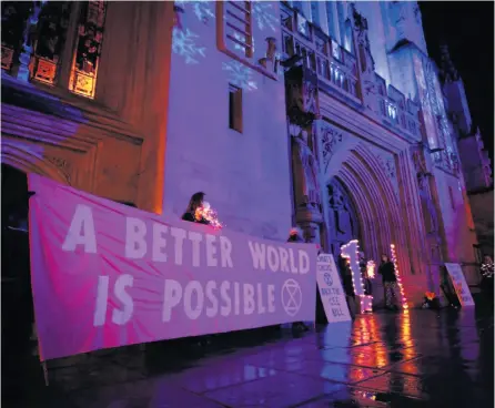  ?? Pic: Jamie Bellinger Photograph­y ?? Environmen­tal groups united at Bath Abbey for a peaceful climate protest