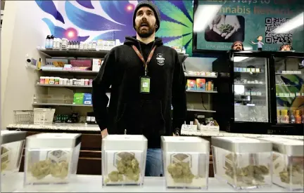  ?? CLIFF GRASSMICK — STAFF PHOTOGRAPH­ER ?? Luke Conway talks about the products sold at Karing Kind on 5854Rawhid­e Court, in Boulder, on Friday. Karing Kind was the first location in Boulder County to open for retail marijuana sales 10years ago.
