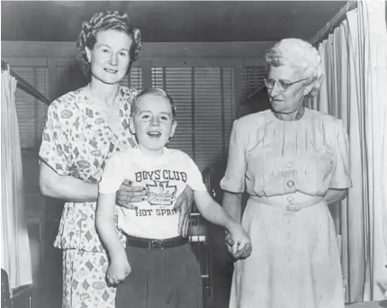  ??  ?? On opposite page: At top, Levi Hospital, below, 80-year-old and 4-year-old patients in 1951. Above, His mother and Administra­tor Regina Kaplan (right) watch arthritis patient Dickie Riedel take his first steps after his treatment at the Levi; below,...