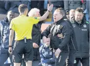  ??  ?? Clash Neil Lennon and ref Kevin Clancy controvers­y