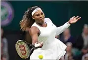  ?? KIRSTY WIGGLESWOR­TH / AP, FILE ?? Serena Williams plays a return to Aliaksandr­a Sasnovich of Belarus in a women’s singles first round match on day two of the Wimbledon Tennis Championsh­ips in London on June 29, 2021.