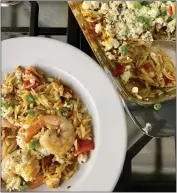  ?? PHOTOS BY CATHY THOMAS ?? Mediterran­ean-style shrimp and orzo casserole boasts vibrant colors and flavors, topped by tangy feta cheese.