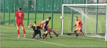  ??  ?? Liam Smith gets a vital touch to deny Dene Cassells a last gasp winner.