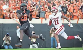  ?? ROB FERGUSON/USA TODAY SPORTS ?? Oklahoma State wide receiver James Washington’s speed will be watched closely by NFL scouts.