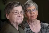  ?? PAUL CHIASSON, THE CANADIAN PRESS ?? Cecile Dionne, left, and her sister Annette. The two women hope continued funding will keep the story of their upbringing alive.