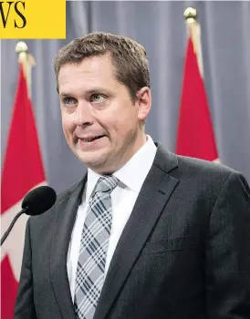  ?? DARREN CALABRESE / THE CANADIAN PRESS ?? Leader Andrew Scheer met the media in Halifax Thursday at the Conservati­ve national convention, where he blasted his former rival, Maxime Bernier, for leaving the party.