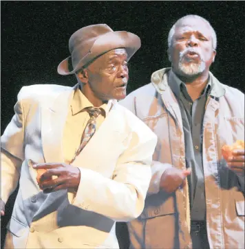  ?? PICTURES: THE NEW YORK TIMES WASHINGTON POST PHOTO BY MICHAEL LUTZKY ?? IN COLLABORAT­ION: Winston Ntshona, left, as Sizwe, and John Kani as Buntu in the play Sizwe Banzi is Dead at the BAM Harvey Theater in Brooklyn, April 8, 2008. Right: Winston Ntshona and John Kani revisit their roles in The Island, the 1973 South African prison drama that is enjoying a second round of internatio­nal acclaim.