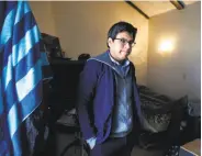  ??  ?? David Cruz Hernandez, shown leaving his Sunset District home, emigrated from Mexico 11 years ago but plans to relocate to England because his immigratio­n status has made his prospects uncertain in the U.S. Cruz Hernandez is a UC Santa Cruz graduate...