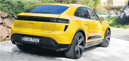  ?? ANDREW MCCREDIE ■ POSTMEDIA ?? nd
The author says: “As with most every Porsche ever built, the Macan EV’S elite performanc­e is paired with an exterior design to match. It takes the gas Macan’s skin and stretches it to an even sleeker design.”