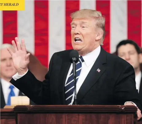  ?? JIM LO SCALZO/POOL IMAGE VIA AP ?? Saying “the time for small thinking is over,” U.S. President Donald Trump addresses a joint session of Congress in Washington on Tuesday.