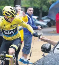  ??  ?? Chris toasts with his manager on the final leg yesterday