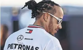  ?? SONG HAIYUAN/MB MEDIA/GETTY IMAGES ?? Lewis Hamilton insisted moving to Ferrari was the right decision for him