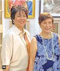  ??  ?? 14
Glass mosaic artist Imelda Pangan with Rizalina Pangan