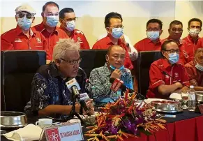  ??  ?? Addressing the media: (From left) Hamzah and Hajiji during the press conference after the meeting with Sabah Bersatu leaders.