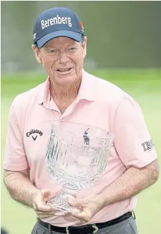  ?? AFP ?? Tom Watson celebrates with the trophy after winning the Par-3 Contest.