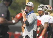  ?? Lea Suzuki / The Chronicle 2020 ?? Which rookie QB will 49ers head coach Kyle Shanahan want to see throwing passes for him in training camp in 2021?
