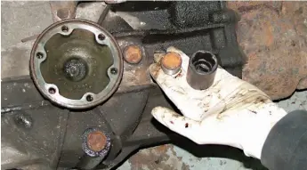  ??  ?? Many transmissi­on drain and filler plugs – shown here on a 924S transaxle removed from the car – require the use of a hefty hexagonal key to locate in their central recess in order to undo them. They often ‘round out’, though, in which case one of...