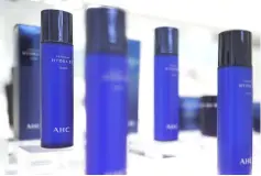  ??  ?? Cosmetic products are seen on display at an AHC cosmetic store in Seoul. Unilever announced a 2.27 billion euro (US$2.67 billion) deal for Carver Korea in September – maker of the AHC cosmetics brand, whose China sales rose more than 30 per cent in...
