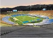  ?? JAYNE KAMIN-ONCEA GETTY IMAGES ?? UCLA and USC will meet today in a fanless Rose Bowl, which is just fine with both coaches.