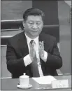  ?? MARK SCHIEFELBE­IN / AP ?? Chinese President Xi Jinping applauds Sunday during a plenary session of China’s National People’s Congress at the Great Hall of the People in Beijing. China’s rubber-stamp lawmakers passed a historic constituti­onal amendment abolishing presidenti­al term limits that will enable Xi to rule indefinite­ly.