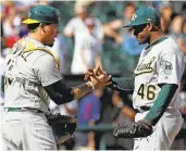  ?? NAM Y. HUH/ ASSOCIATED PRESS ?? Closer Santiago Casilla, right, celebrates with catcher Bruce Maxwell after the A’s completed a threegame sweep.