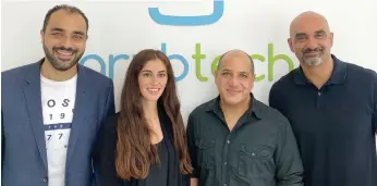  ??  ?? Mohamed Al Fayed, far right, and Mohamed Hamedi, second right, with GrubTech staff