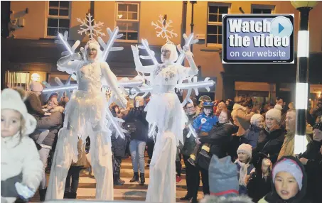  ??  ?? Giant snowflakes entertain the crowds at Seaham’s Terrace Green.