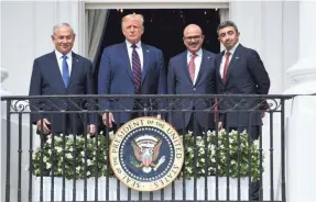  ?? SAUL LOEB/AFP VIA GETTY IMAGES ?? Israel Prime Minister Benjamin Netanyahu, President Donald Trump, Bahrain Foreign Minister Abdullatif al-Zayani and United Arab Emirates Foreign Minister Abdullah bin Zayed Al-Nahyan at the White House.