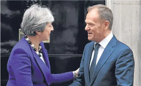  ?? Picture: PA. ?? Prime Minister Theresa May greets European Council president Donald Tusk at No 10.