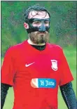  ??  ?? The man in the mask - EK Thistle’s Jordan Conner wears a mask to protect a recently broken nose.