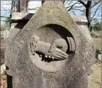  ?? Submitted photo ?? ARKANSAS BURIAL CUSTOMS: In Hollywood Cemetery, the clasping hands on the marker of G. Clemson (died 1891) shows the farewell between the living and the deceased. Abby Burnett will present “Gone to the Grave: Arkansas Burial Customs” at the meeting of...