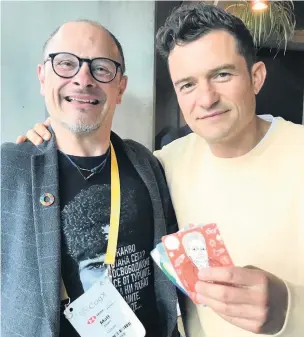  ??  ?? Matt Eagles with film star Orlando Bloom and the ParkyCards