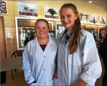  ??  ?? Kutztown eighth graders Katelyn Reidenhour and Alyssa Love said Science Olympiad is fun.