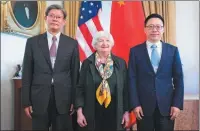  ?? SAUL LOEB / AFP ?? China’s Vice Minister of Finance Liao Min (right), People’s Bank of China Deputy Head Xuan Changneng (left), and US Treasury Secretary Janet Yellen pose on Tuesday during the 4th meeting of the China-US economic working group in Washington, DC.