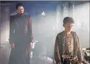  ?? Laurie Sparham Warner Bros. ?? HUGH JACKMAN, left, is Blackbeard and Levi Miller plays rebellious 12-year-old Peter in “Pan.”