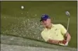  ?? CHRIS CARLSON — THE ASSOCIATED PRESS ?? Jordan Spieth hits from a bunker to the 15th green during a practice round at the PGA Championsh­ip golf tournament at Quail Hollow Club Tuesday in Charlotte, N.C.