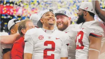  ?? KEVIN C. COX/GETTY IMAGES ?? Jalen Hurts (2) celebrates Alabama’s SEC championsh­ip victory Dec. 1.