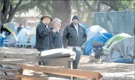  ?? SHERRY LAVARS — MARIN INDEPENDEN­T JOURNAL ?? From left, homeless advocate Robbie Powelson; Anthony Prince, attorney at the California Homeless Union; and Lee Gerner Park resident Jason Sarris address the media Tuesday.