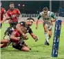  ??  ?? This tackle by Chiefs loose forward Lachlan Boshier on Crusaders second five-eighth Ryan Crotty resulted in a penalty try being awarded last Saturday night. Boshier was yellow carded.